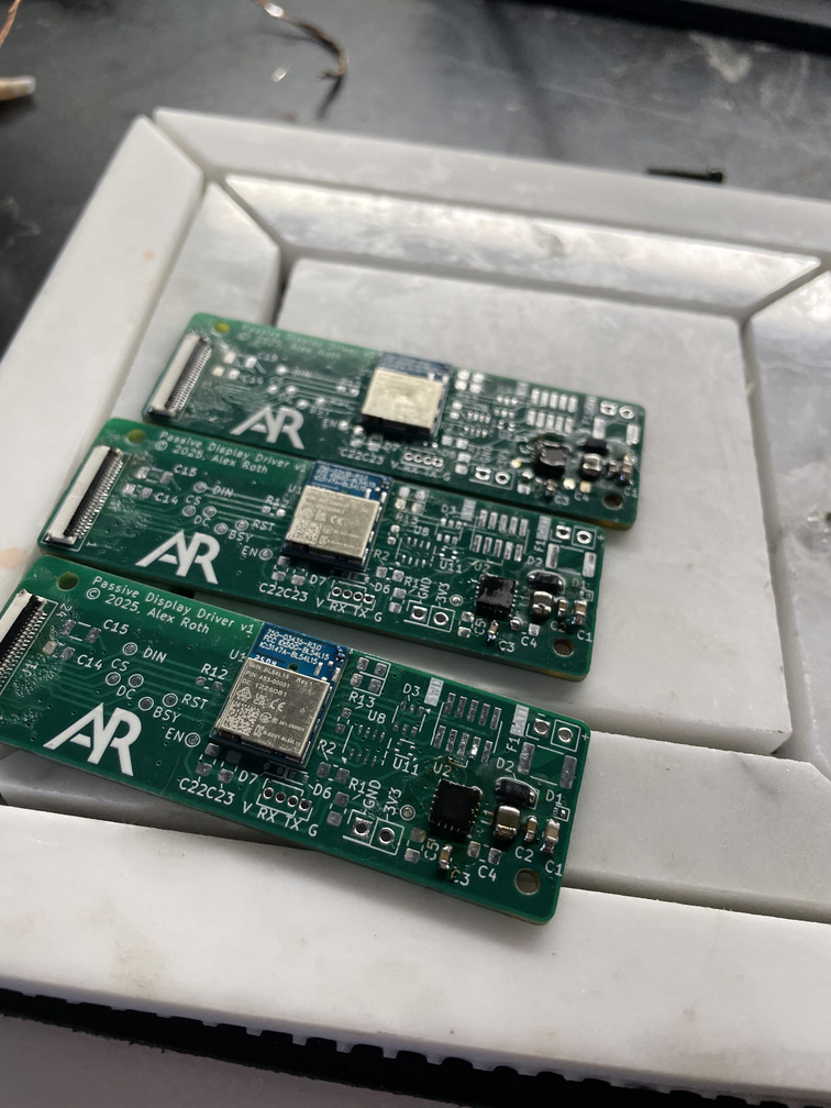 3 boards with BL54L15 modules and nPM2100 soldered in place